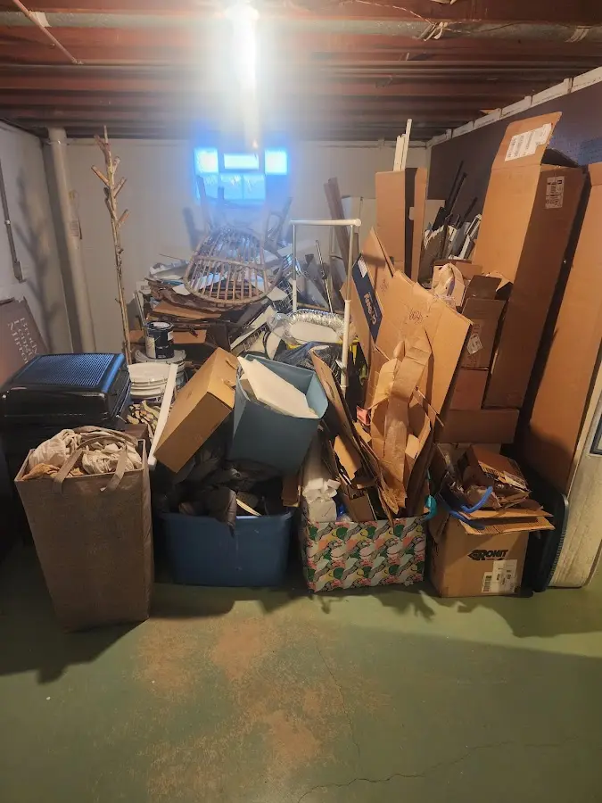 Roll-off dumpster container at job site for 2 Yard Dumpster Rental in Orion